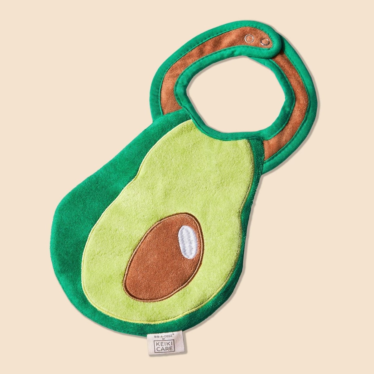 avocado baby drool bib flat lay, neutral aesthetic handmade product photo