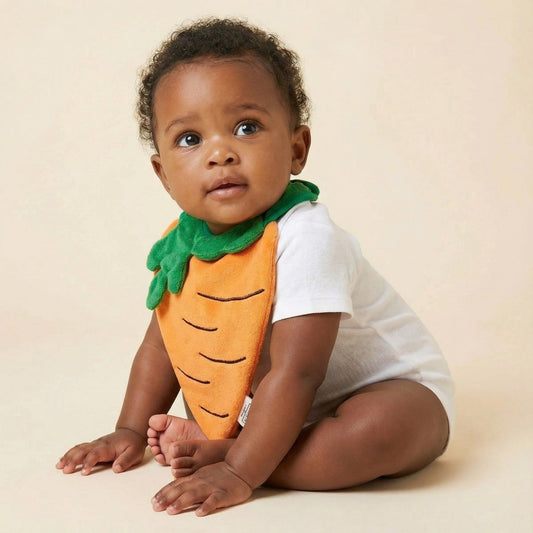 baby wearing handmade carrot-shaped drool bib, bright playful design